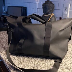 Rains waterproof Black weekend Duffel Bag